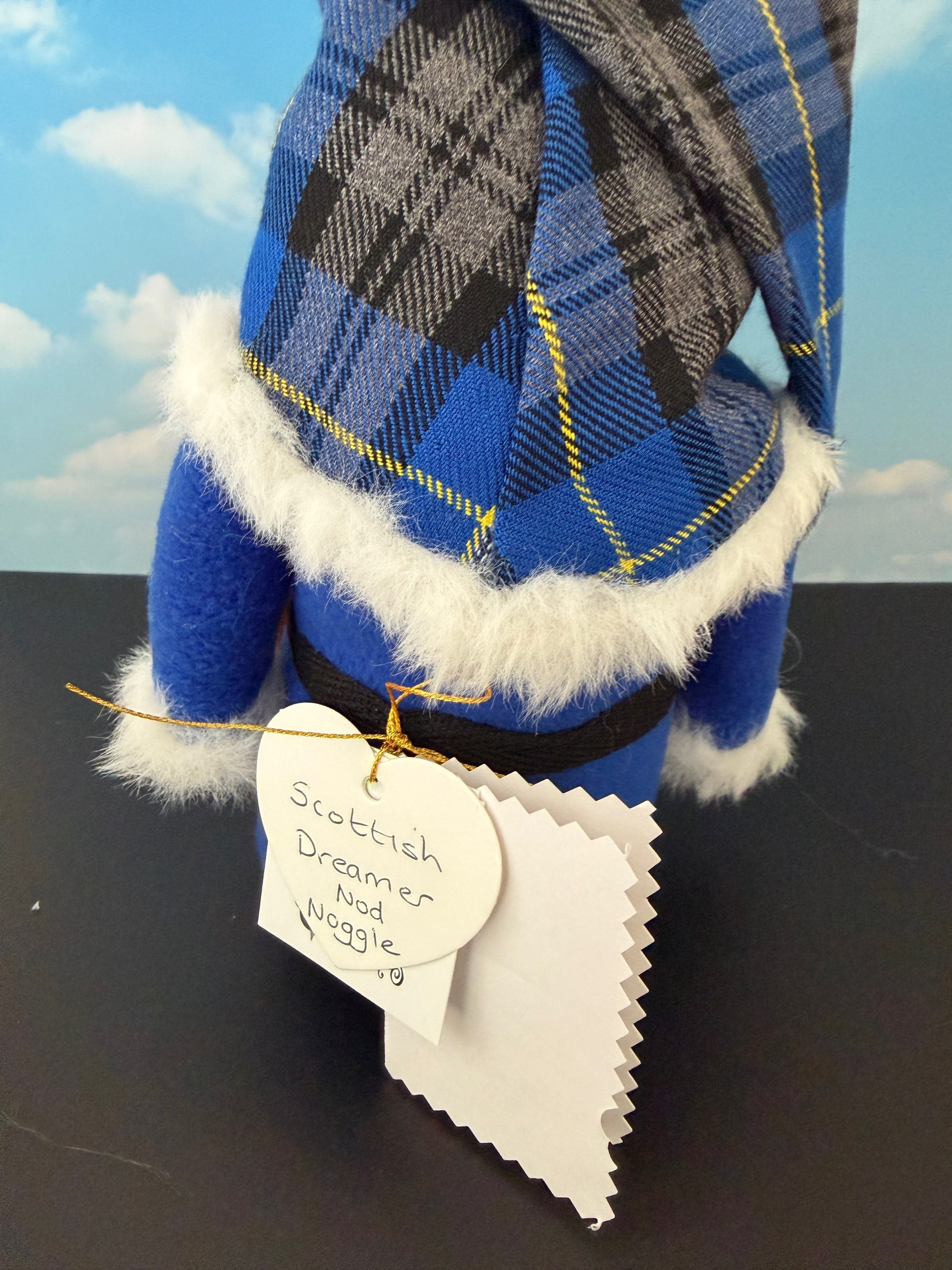 Rear view showing handmade tartan fabric gnome design with labels
