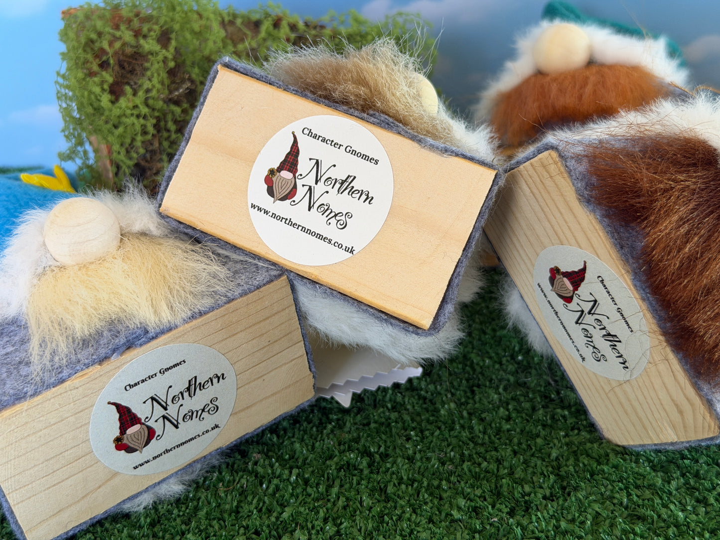 Three wooden gonks from the Blossom wee folk range, with white labels reading 'Character Gnomes by Northern Nomes and are arranged to show they are made from reclaimed wood.