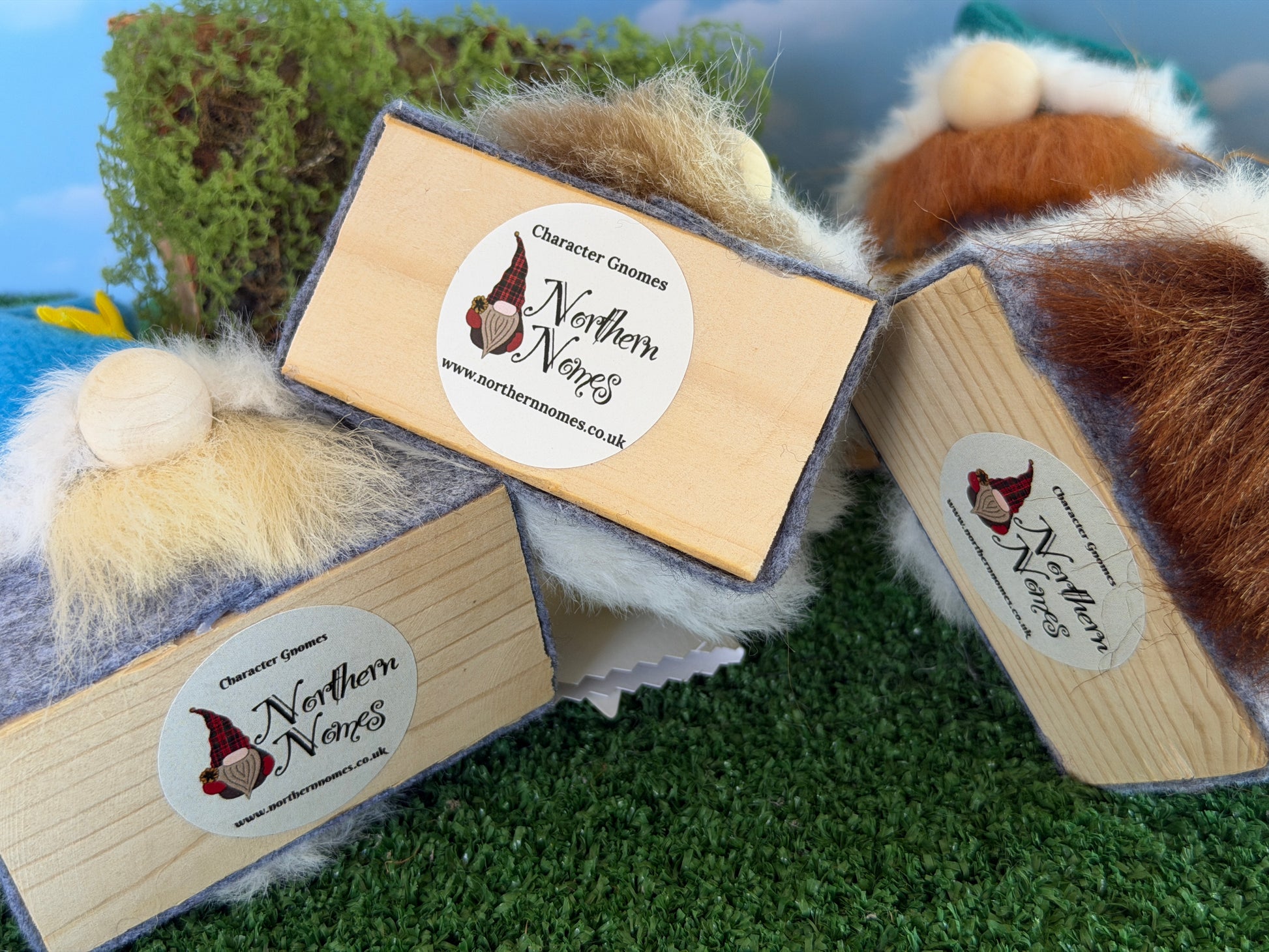Three wooden gonks from the Blossom wee folk range, with white labels reading 'Character Gnomes by Northern Nomes and are arranged to show they are made from reclaimed wood.