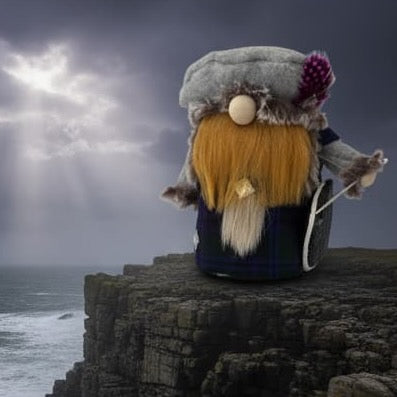 A handmade Scottish Chieftain gnome with a long ginger beard, grey hat with a purple feather, stands on a rocky cliff edge overlooking a dramatic stormy ocean with sunbeams breaking through dark clouds. From the Chieftain collection of gnomes by Northern Nomes.